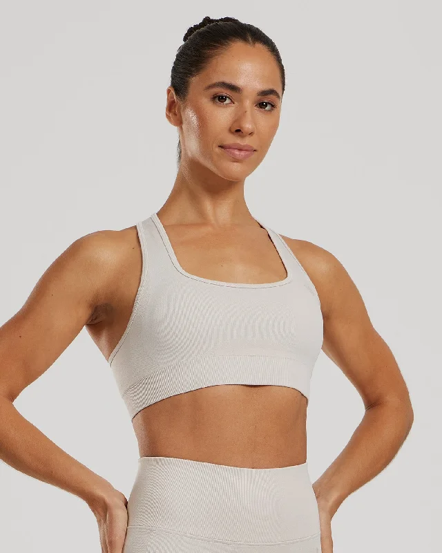 Sports bra for barre class -Motion Seamless Racer Back Bra | Stone