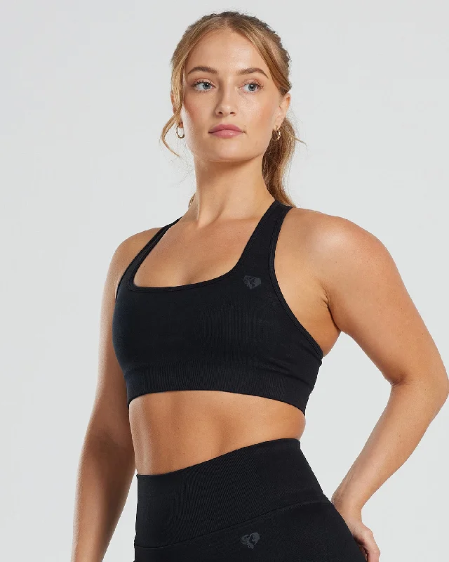 Sports bra with secure padding -Motion Seamless Racer Back Bra | Black