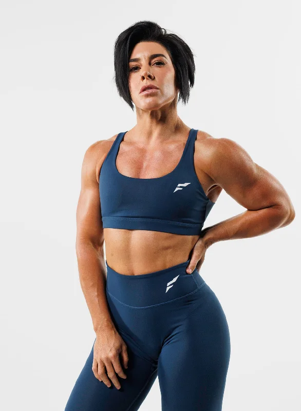 Blue sports bra with padding -CRISSCROSS ESSENTIAL BRA - FRENCH NAVY